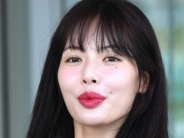 Tampil dengan Busana Ketat di Bandara, Bibir Seksi HyunA Kembali Disorot