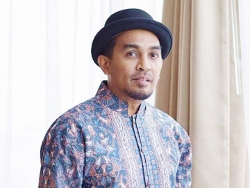 Ikuti 'Jejak' Sang Istri, Glenn Fredly Akhirnya Pamer Foto Pernikahan