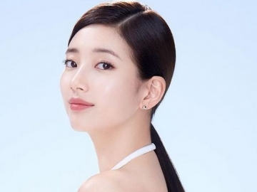 Pamer Kulit Mulus Bak Porselen dengan Rambut Hitam Panjang, Suzy Makin Bikin Kesensem