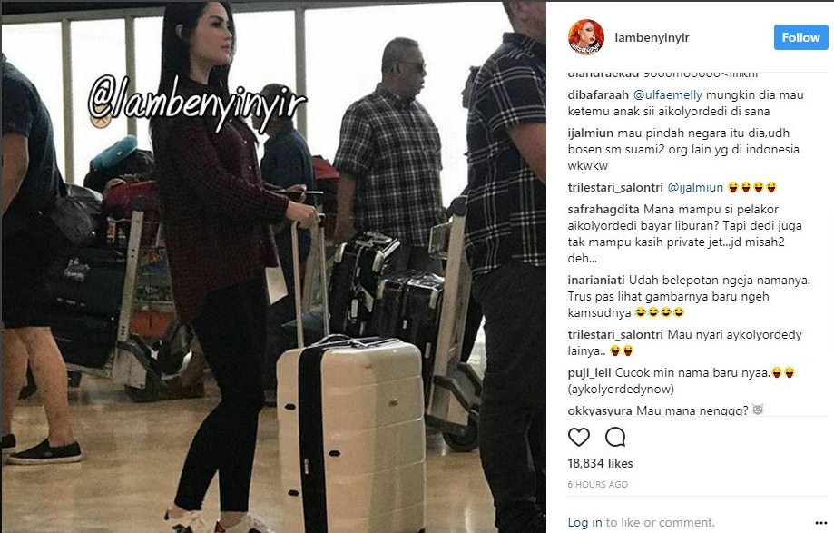 Foto Jennifer Dunn di bandara tanpa Faisal Harris