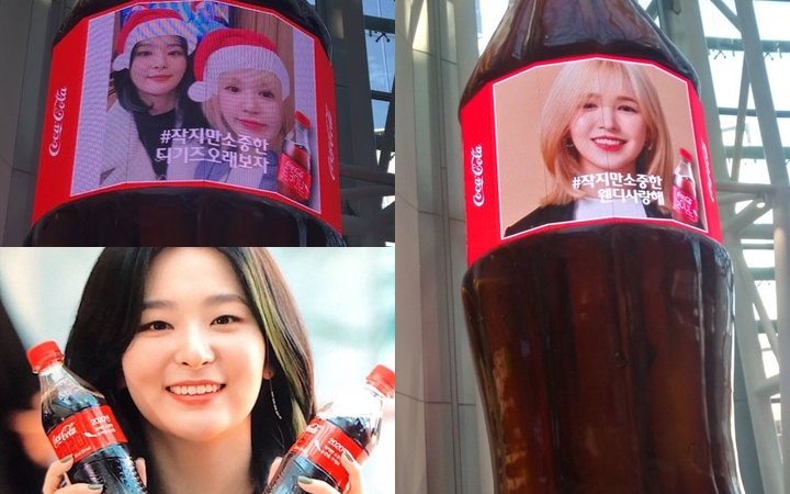 Jadi Model Iklan, Manisnya Seulgi Red Velvet Malah Pasang Foto Wendy di Botol Minuman Raksasa